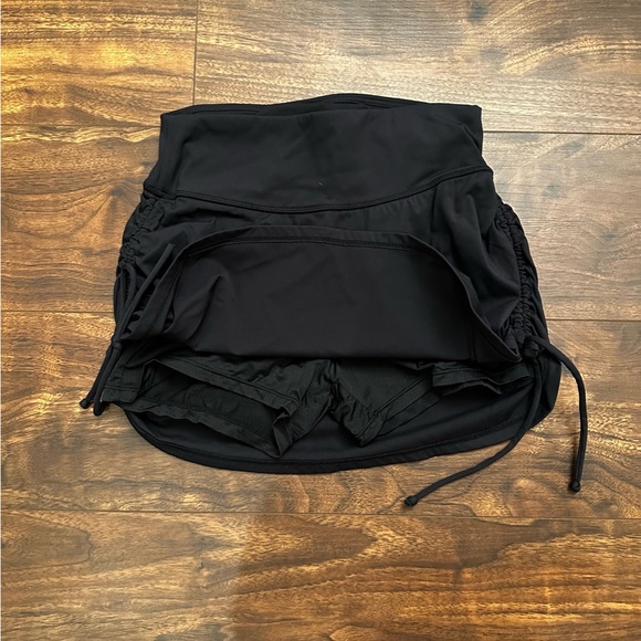 Black skort - ties on both sides to make it higher or lower - size small - Picture 3 of 3